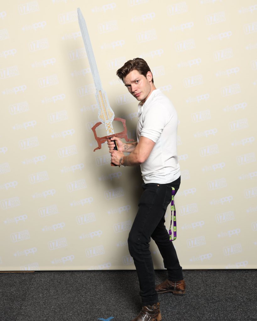 Dominic Sherwood with the LEGO Shadowhunters The Mortal Instruments Soul Sword at Oz Comic-Con Melbourne